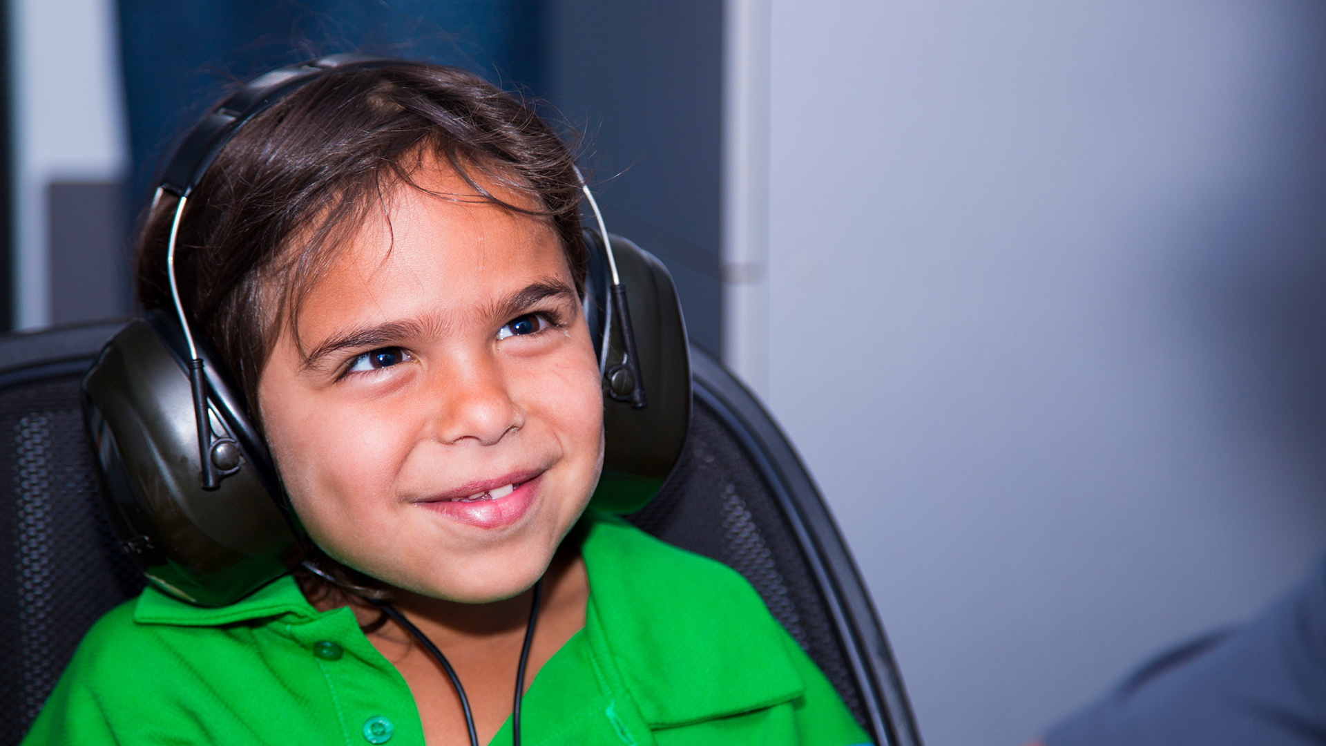 a child wearing headphones