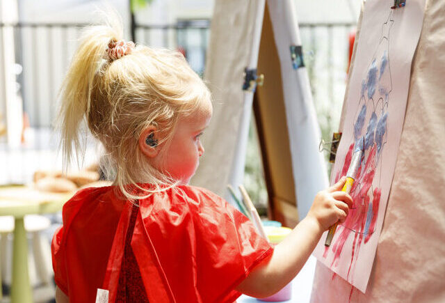 young girl painting